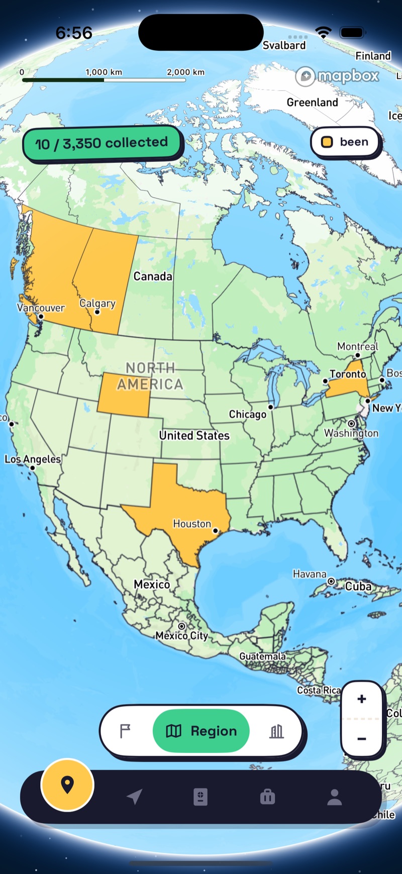 Mapogo's map screen — a globe view with collected regions lit up across North America
